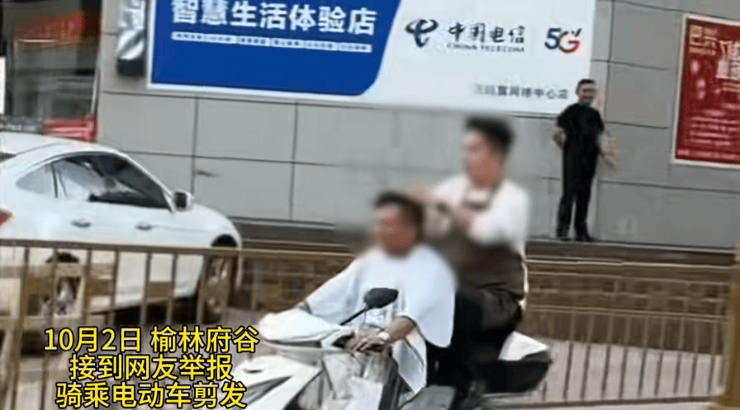 陕西一男子骑电动车时不停理发<strong></p>
<p>博通股票</strong>,被罚款500元、驾驶证记9分;民警呼吁公众注意电动车出行安全
